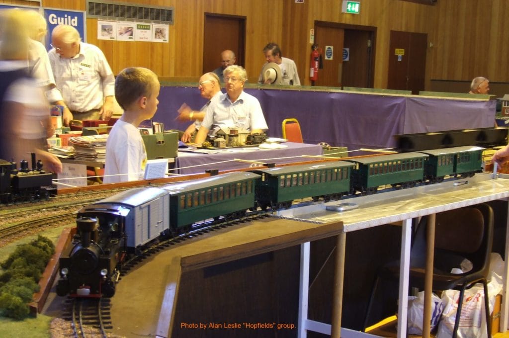 Garden Rail Kent's show at Faversham - view to ekogg stand: John P, Ron S, Geoff R [ Alan Leslie ]