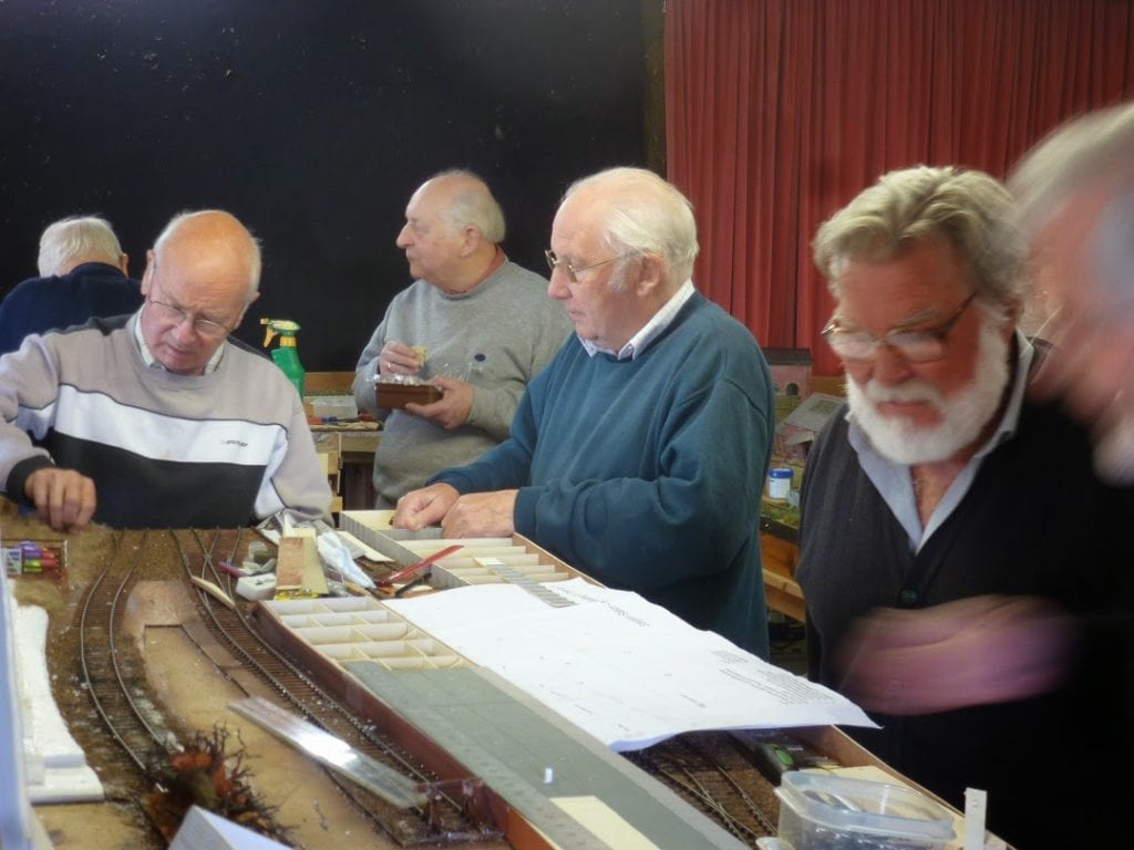 ekogg - Alan, John P & Barry at work on our Edington layout / Maurice lunching by the circuits - May 2nd [Ross S]