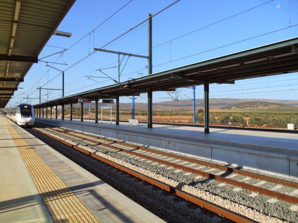 Renfe - Spain - Antequera Santa Ana station - train for Granada arrives on the broad gauge lines - standard gauge high speed line platforms opposite [Rob M]
