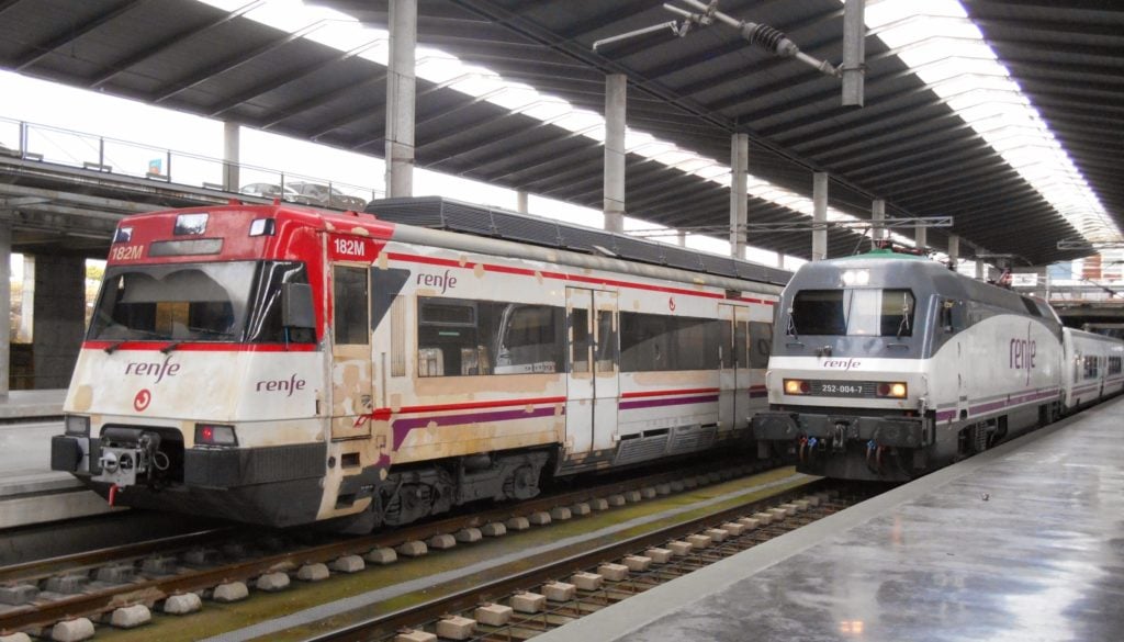 Renfe - Spain - Cordoba - Talgo train to Algeciras with battered local emu - March [Rob M]