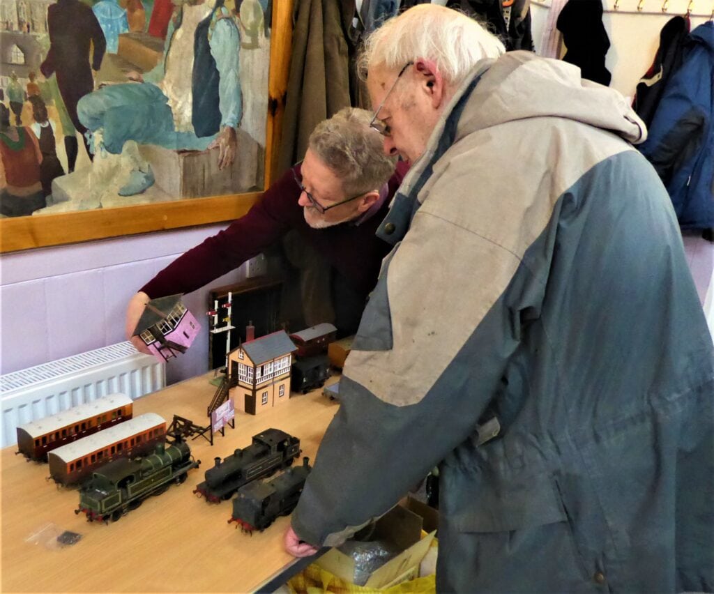 Colin and Bill inspect a model