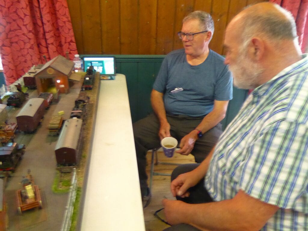 EKOGG 240629 Open Day Andt Sparkes inspecting Richard B's diorama