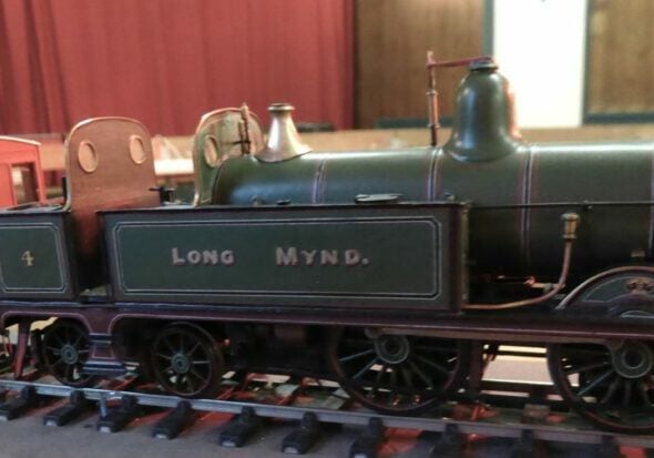 John M's 4-4-2T at the head of vintage train